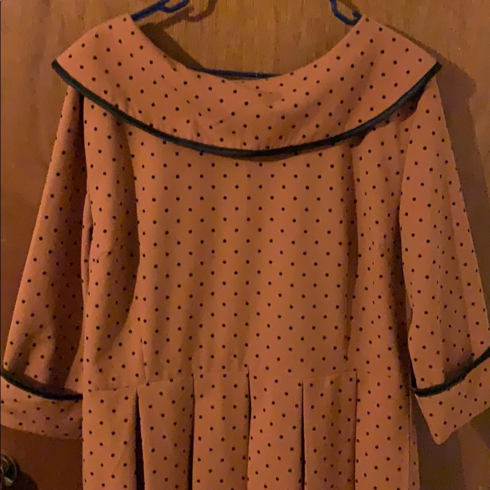 Rust color with black polka dots